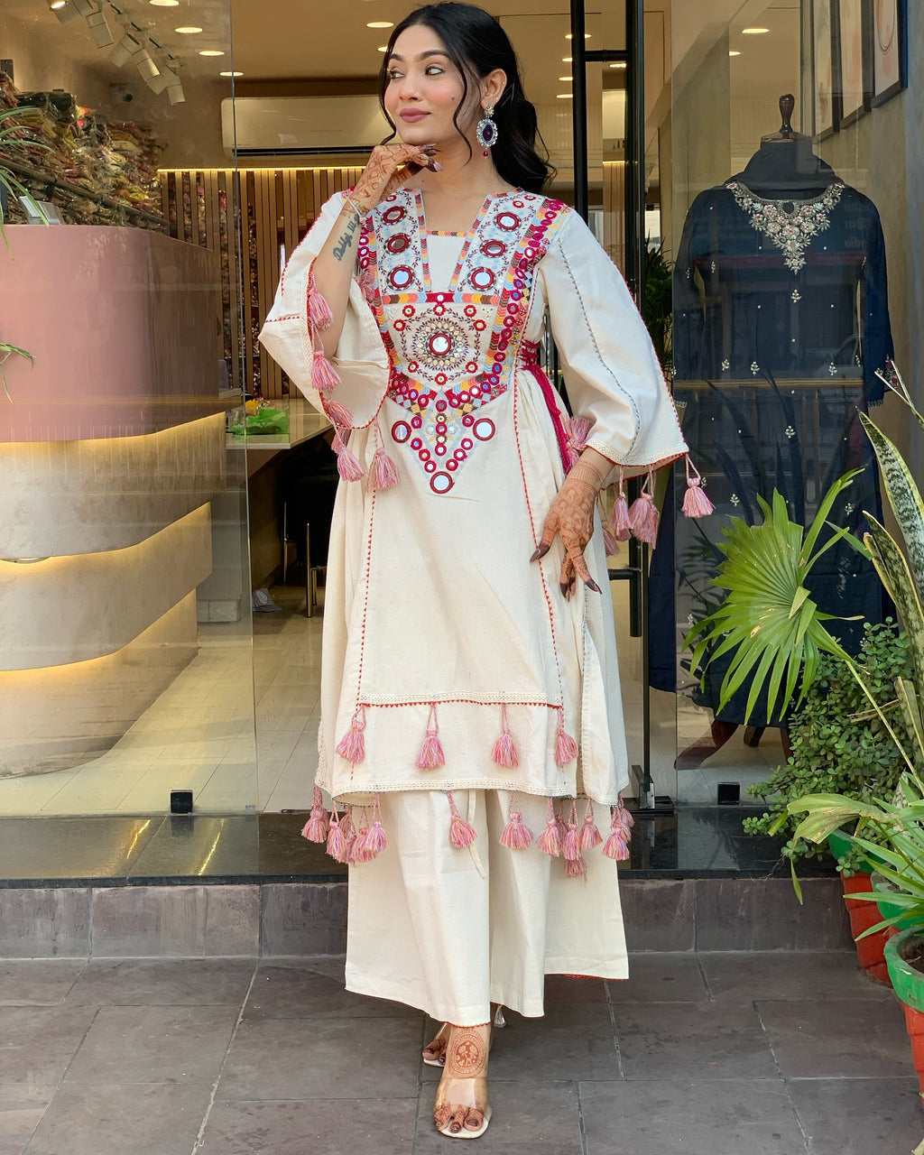 Exquisite Off-White Mirror Work Flex Cotton Kurta Set with Tassel Details