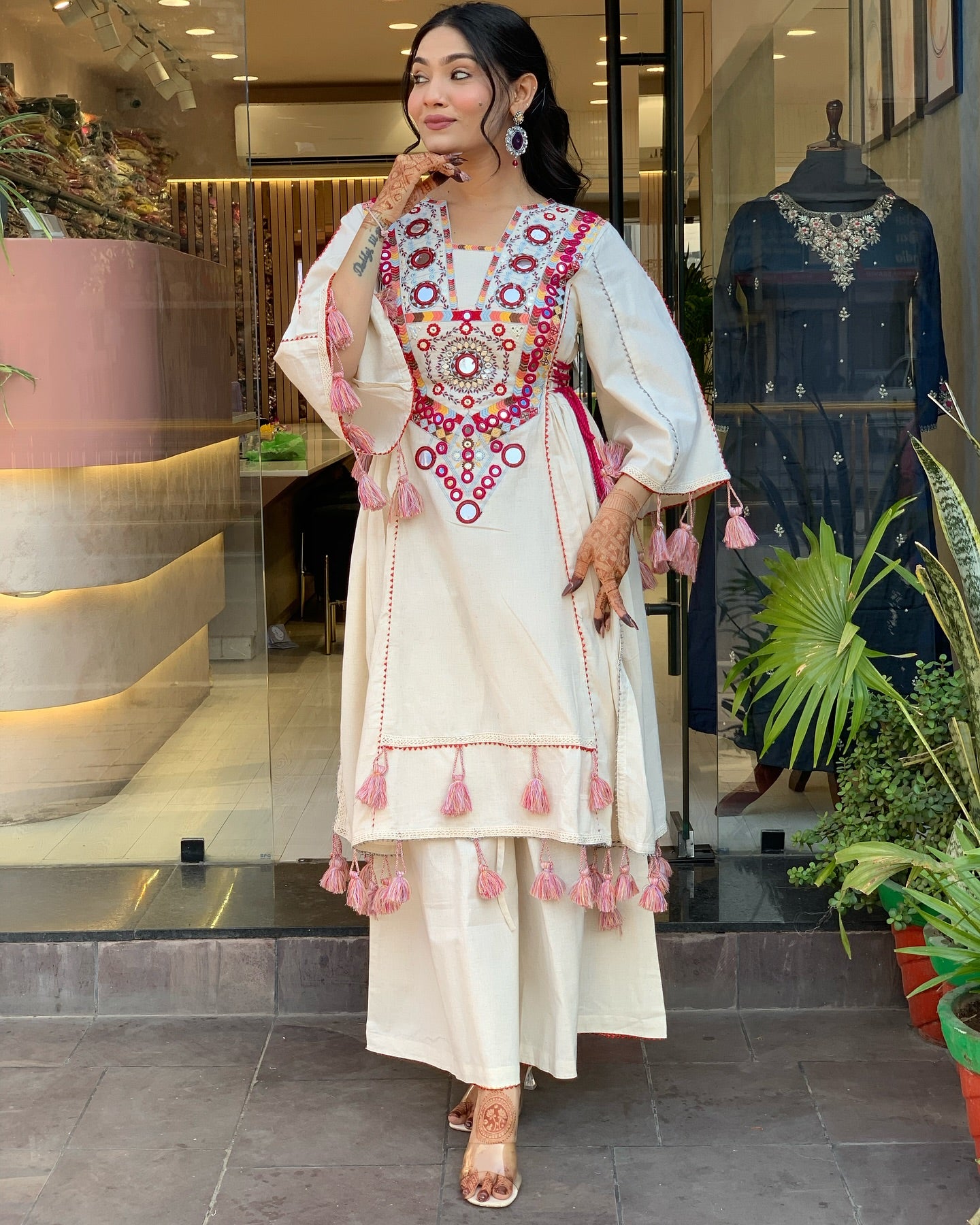 Exquisite Off-White Mirror Work Flex Cotton Kurta Set with Tassel Details
