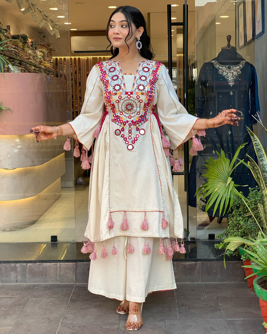 Exquisite Off-White Mirror Work Flex Cotton Kurta Set with Tassel Details
