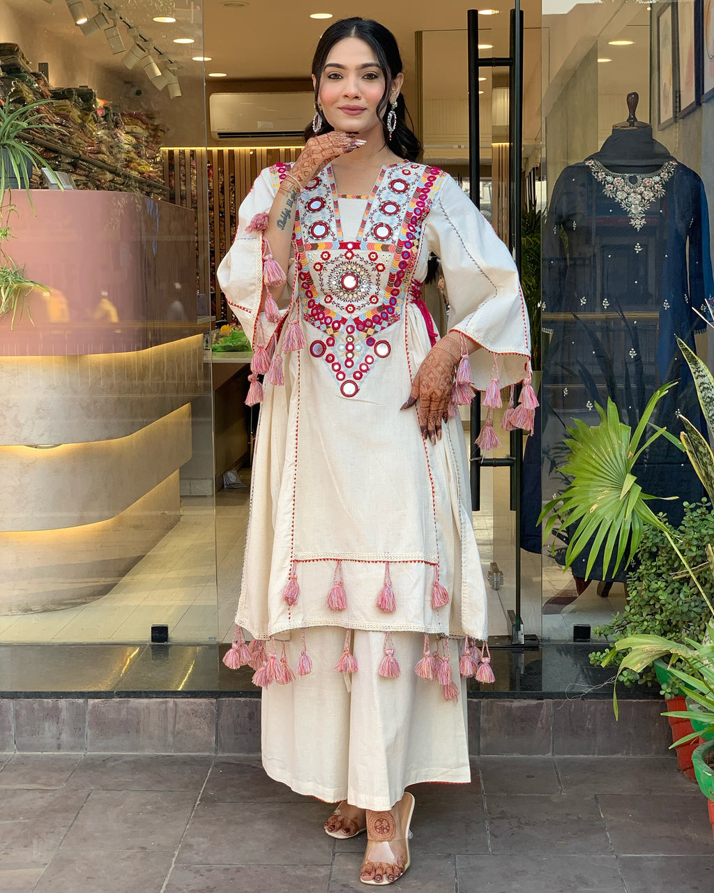 Exquisite Off-White Mirror Work Flex Cotton Kurta Set with Tassel Details