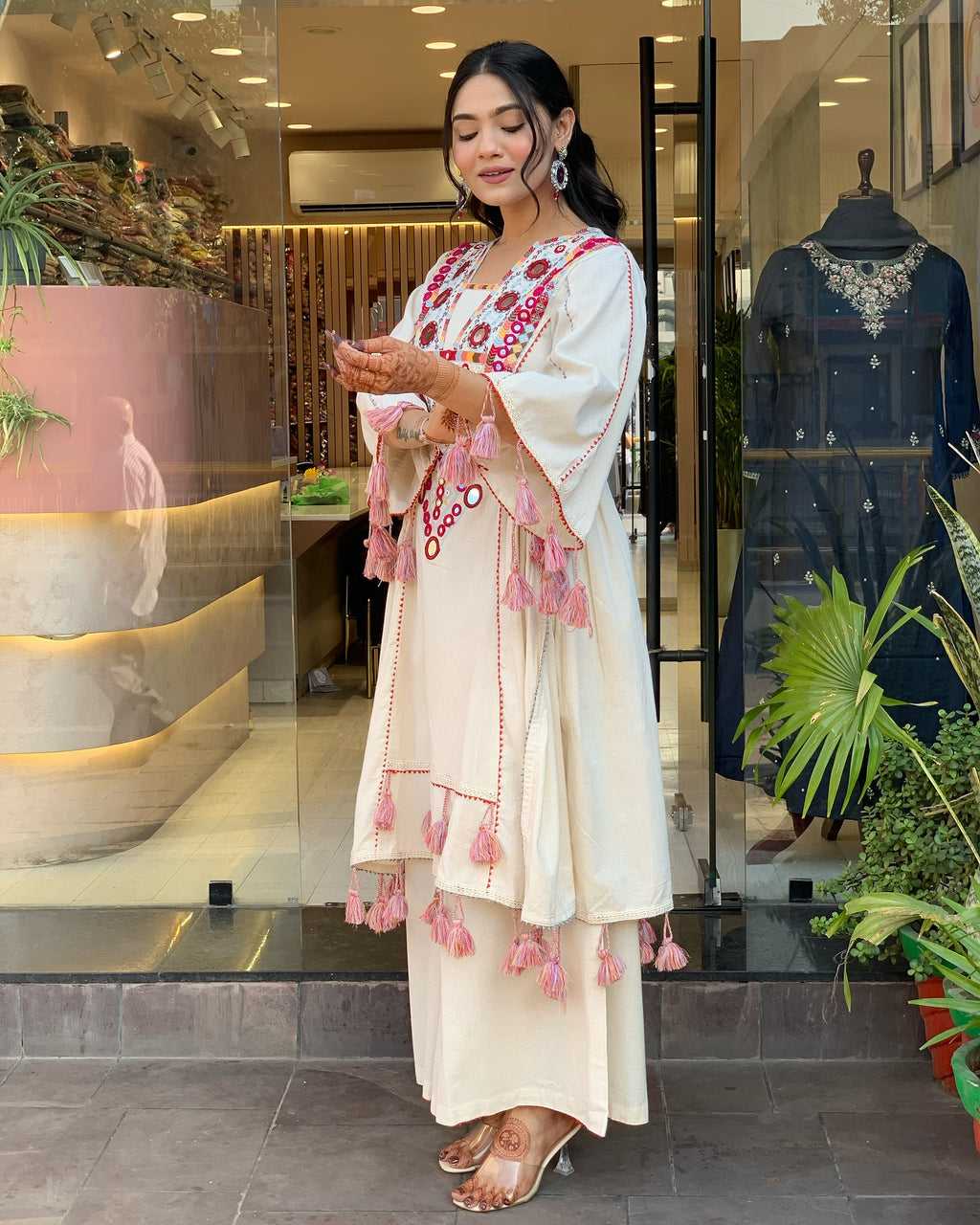 Exquisite Off-White Mirror Work Flex Cotton Kurta Set with Tassel Details