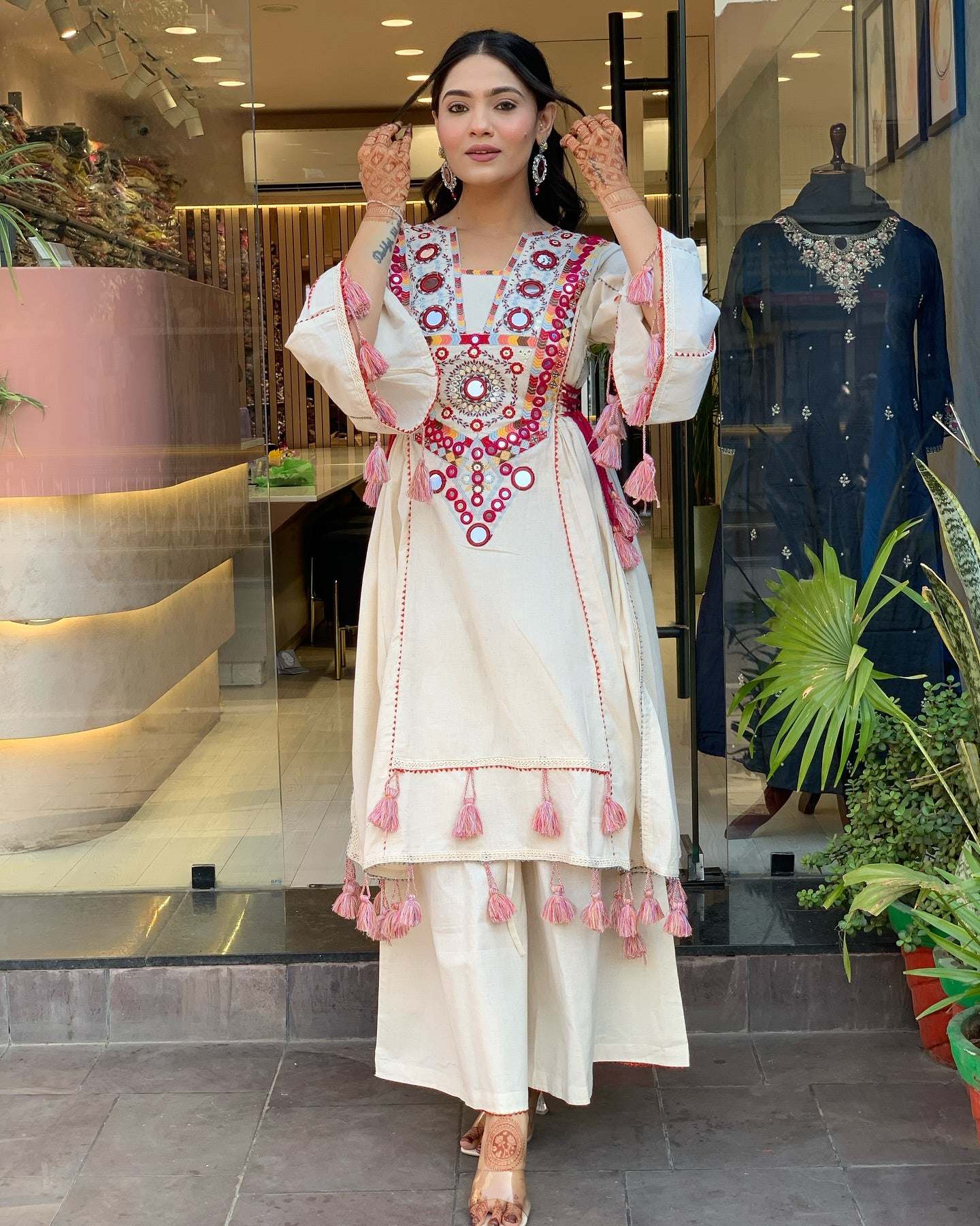 Exquisite Off-White Mirror Work Flex Cotton Kurta Set with Tassel Details