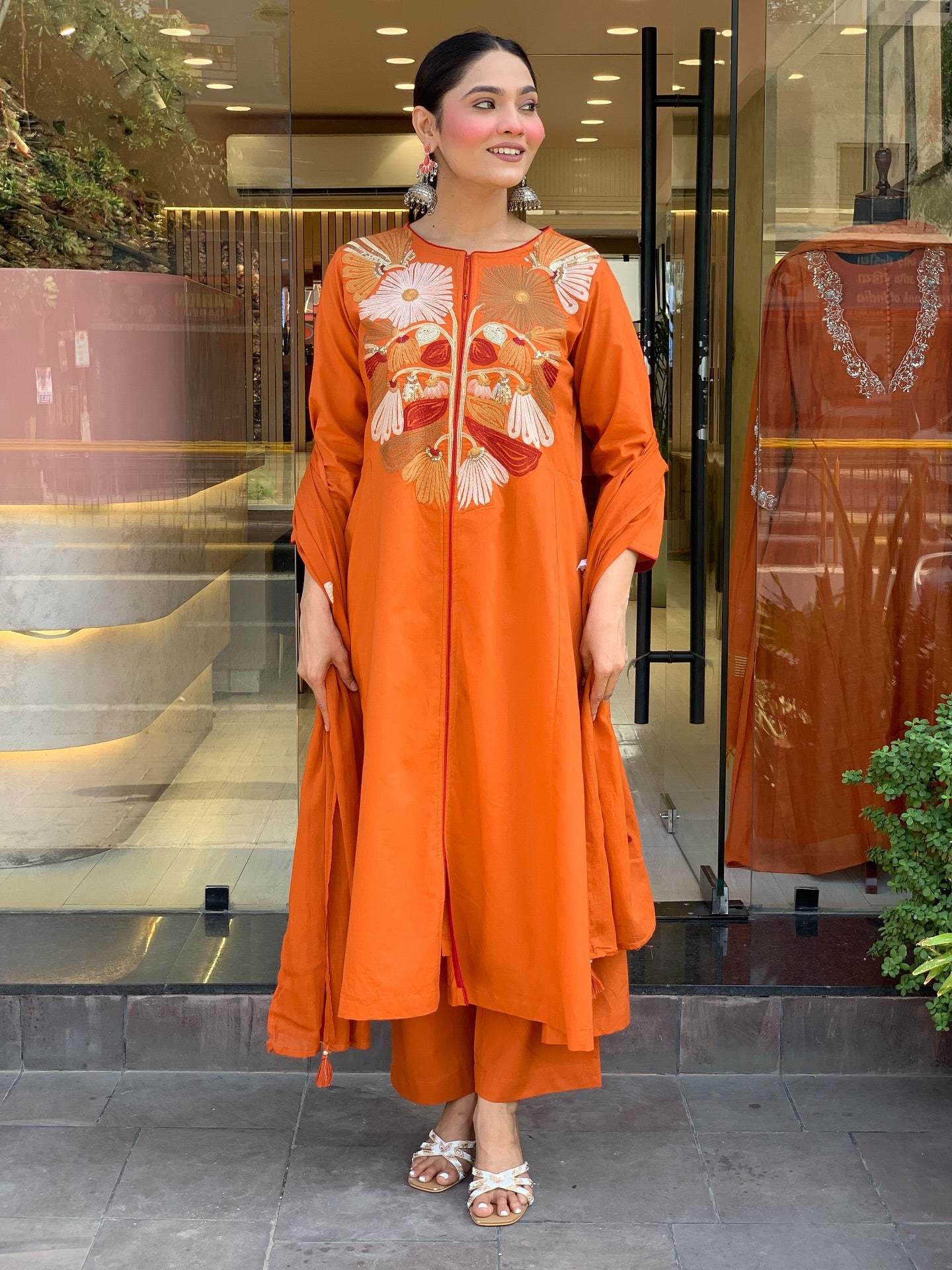 Vibrant Orange Crane Embroidered Kurta Set with Flared Silhouette