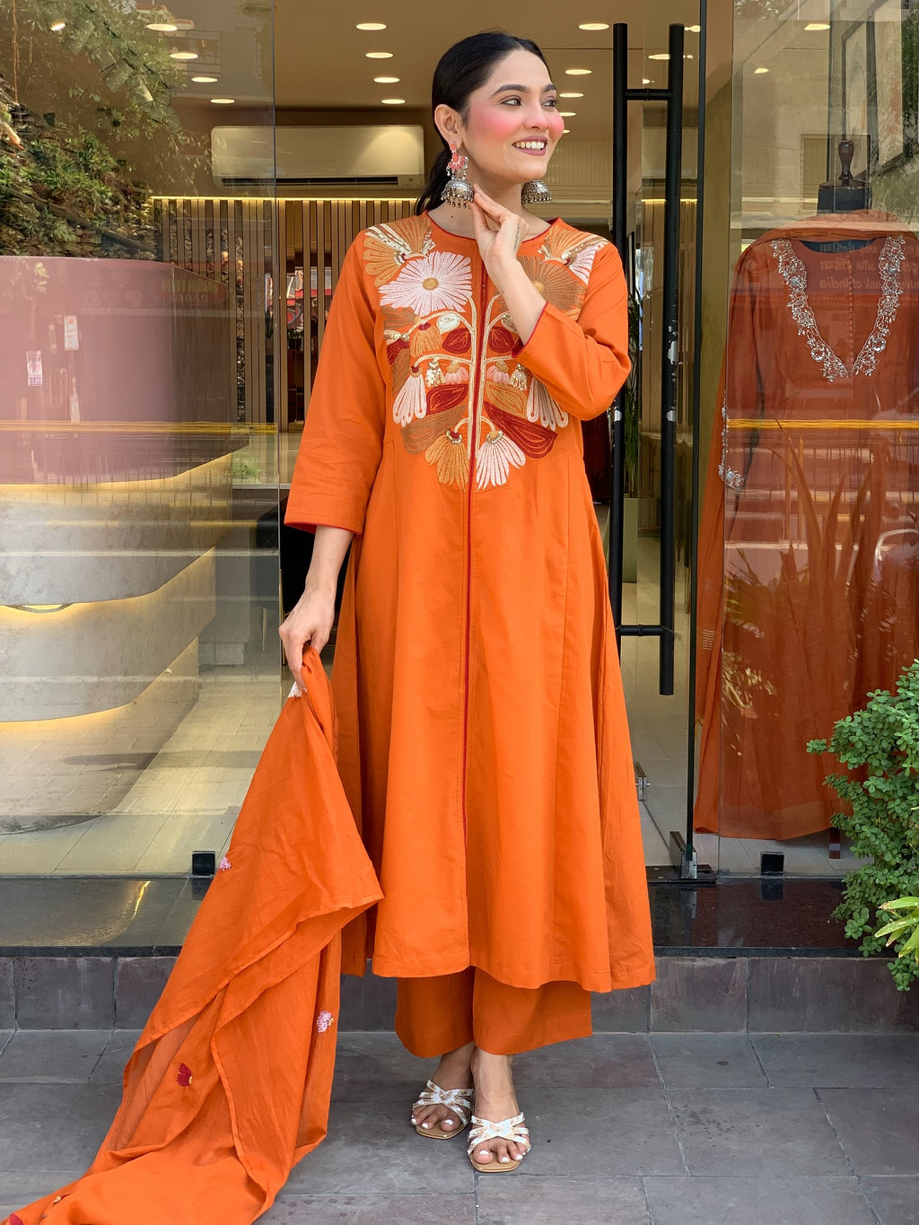 Vibrant Orange Crane Embroidered Kurta Set with Flared Silhouette